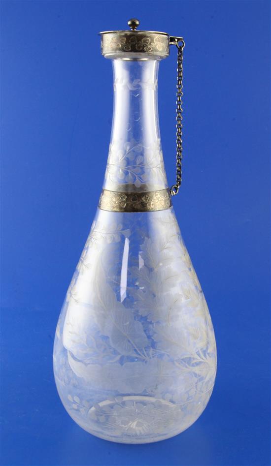 A Victorian engraved silver mounted etched glass claret jug, 11in.